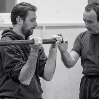 Sifu teaching the Pole form (Luk Dim Book Kwan)